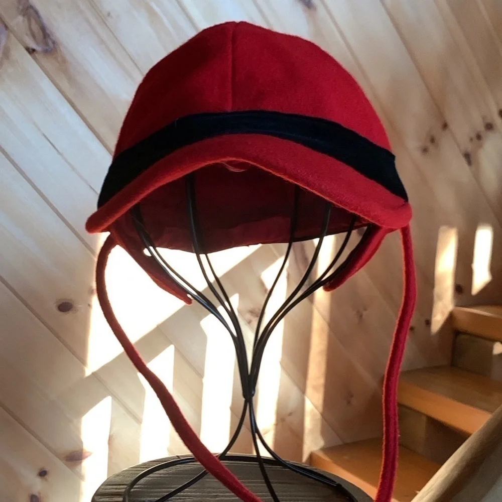 Kid’s dressy red trapper style hat with black velvet trim